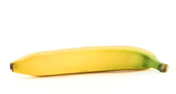 Single yellow spotless banana over white — Stock Photo, Image