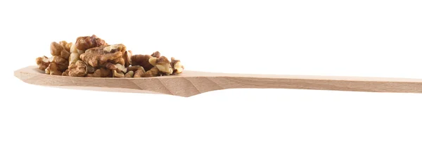 Spoon full of walnuts isolated — Stock Photo, Image