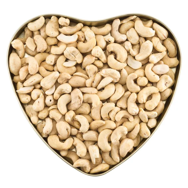 Caixa em forma de coração cheia de amendoins — Fotografia de Stock