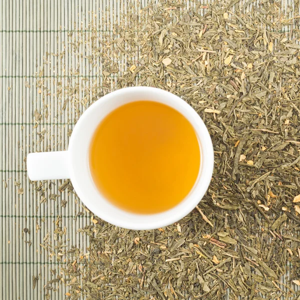 White cup of green tea — Stock Photo, Image