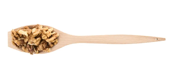 Spoon full of walnuts isolated — Stock Photo, Image