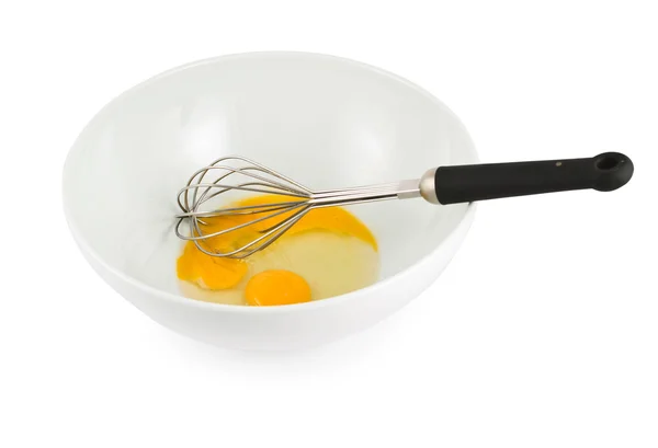 Yolk and protein in a bowl with egg beater — Stock Photo, Image