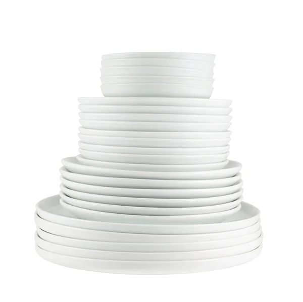 Pile of clean white dish plates isolated — Stock Photo, Image