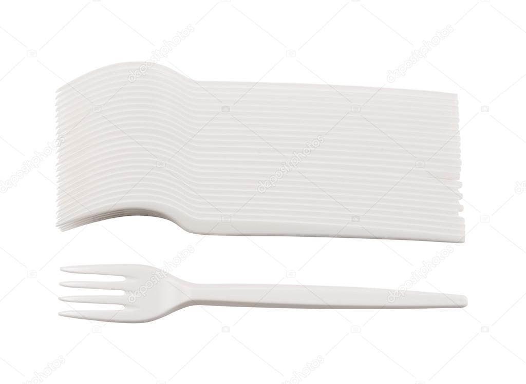 Disposable white plastic forks isolated