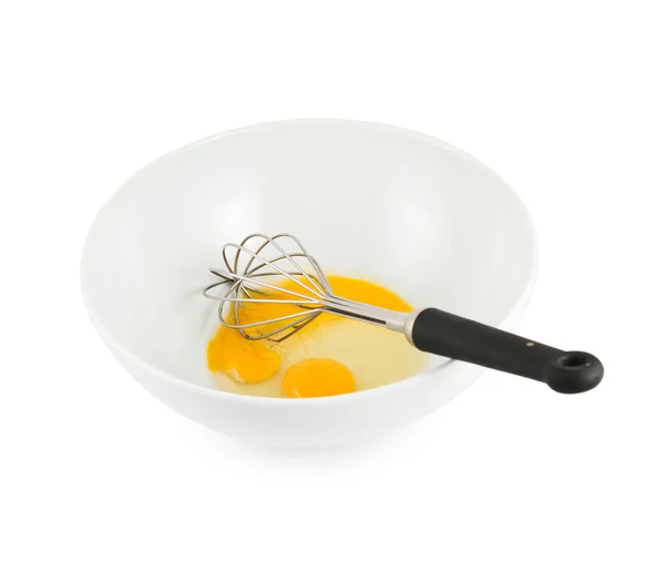 Yolk and protein in a bowl with egg beater — Stock Photo, Image