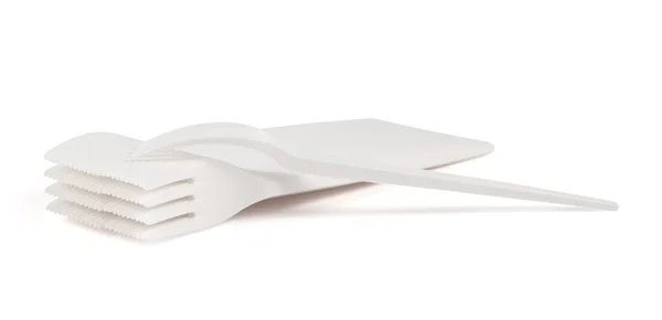 Disposable white plastic forks isolated — Stock Photo, Image