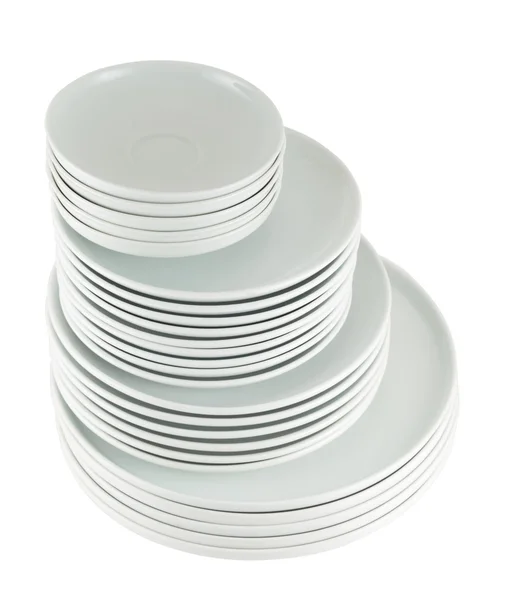 Pile of clean white dish plates isolated — Stock Photo, Image