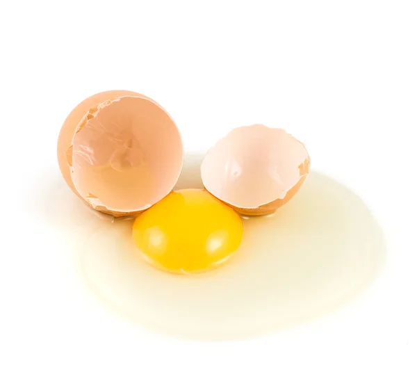 Cracked egg shell with yolk and protein — Stock Photo, Image