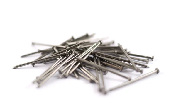Pile of metal nails isolated — Stock Photo, Image