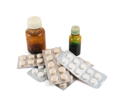 blister kabarcık kutu ve iki şişe yığını
