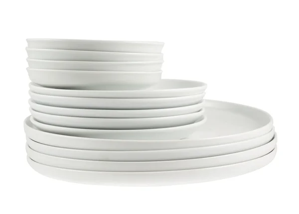 Montón de platos blancos limpios aislados — Foto de Stock