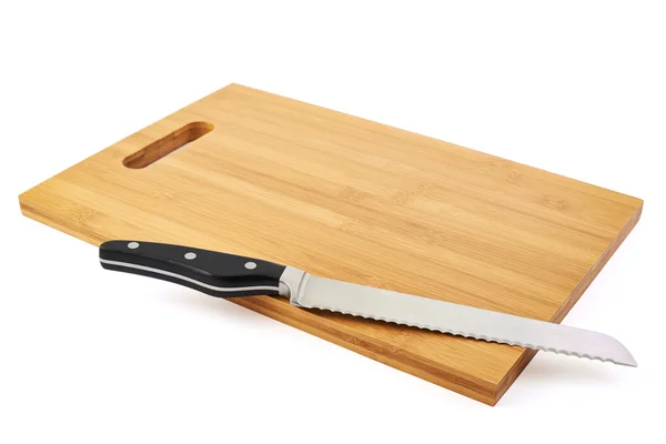 Steel kitchen knife on cutting board — Stock Photo, Image