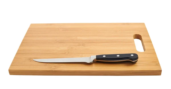 Steel kitchen knife on cutting board — Stock Photo, Image
