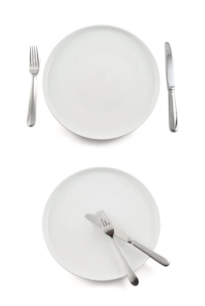 Table knife, fork and ceramic plate isolated — Stock Photo, Image