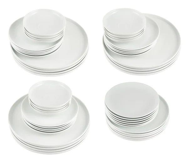 Pile of clean white dish plates isolated — Stock Photo, Image