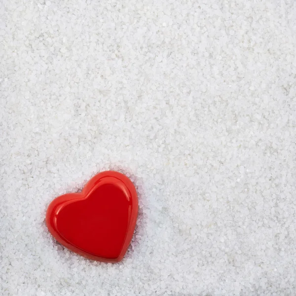 Heart shape in a white sand — Stock Photo, Image