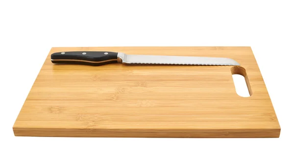 Steel kitchen knife on cutting board — Stock Photo, Image