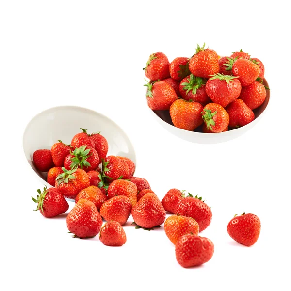 Scattered strawberries in a bowl — Stock Photo, Image