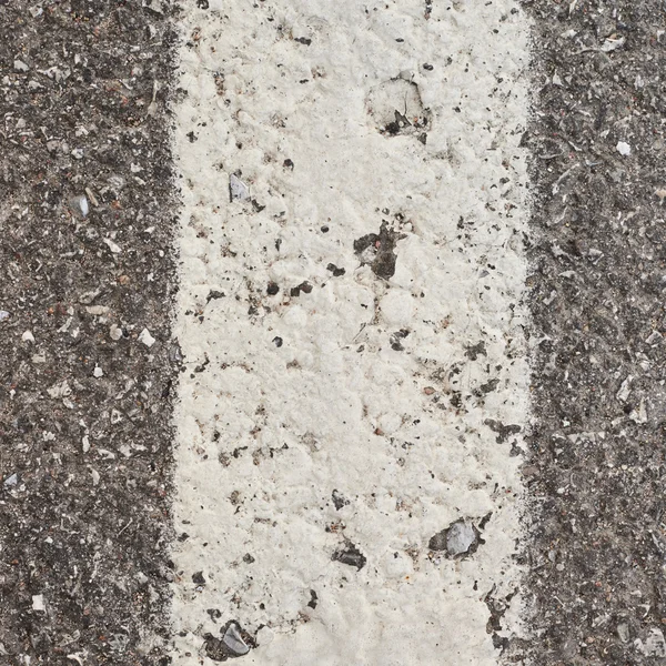 White paint stripe on asphalt — Stock Photo, Image