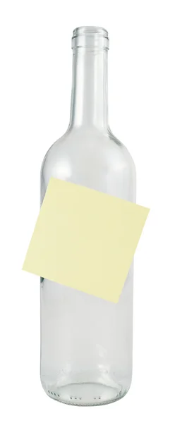 Glass bottle with a sticker — Stock Photo, Image