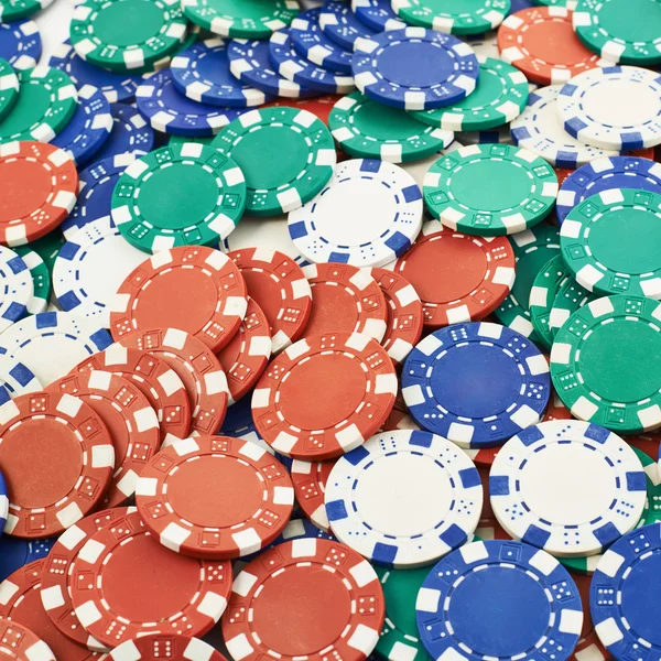 Povrch pokrytý kasino čipy — Stock fotografie