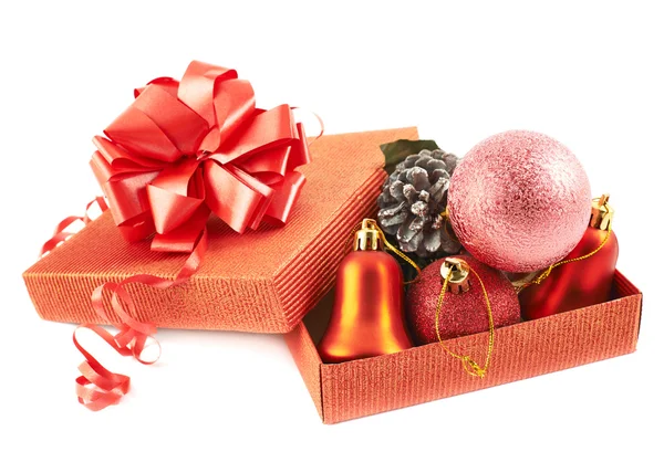 Red gift box full of decorations — Stock Photo, Image