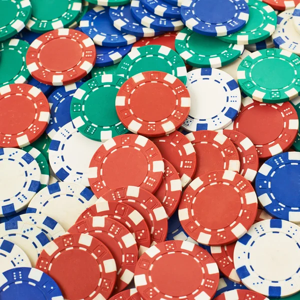 Surface covered with casino chips — Stock Photo, Image