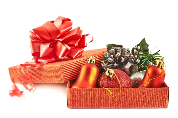 Red gift box full of decorations — Stock Photo, Image