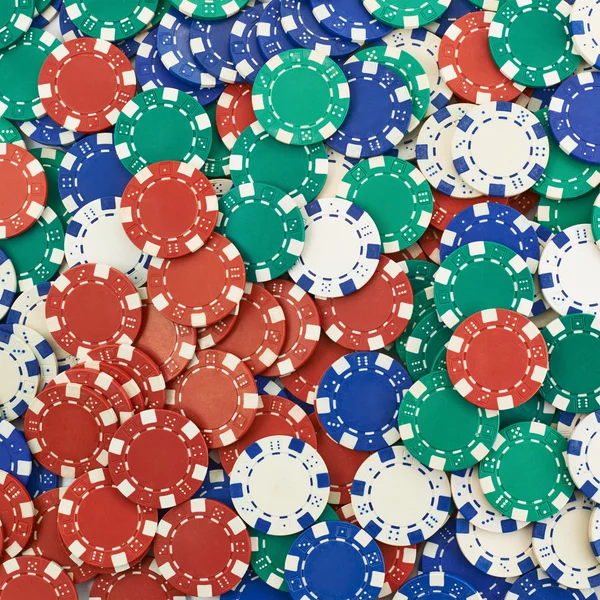 Surface covered with casino chips — Stock Photo, Image