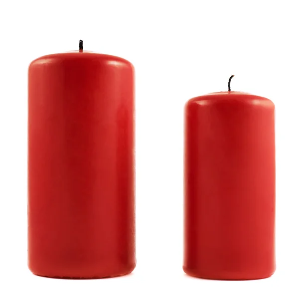Dos velas rojas pequeñas y grandes —  Fotos de Stock