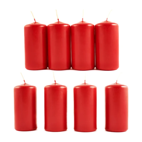 Czerwonego wosku świeca skład na białym tle — Zdjęcie stockowe