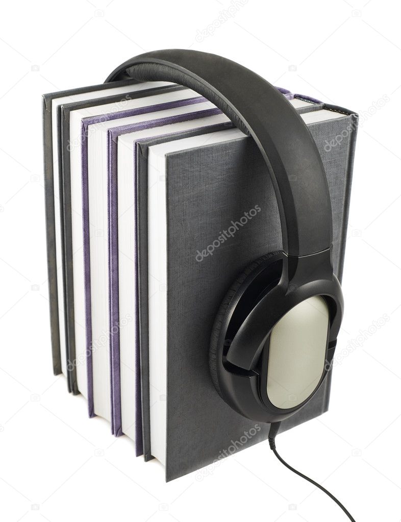 Books with a headphones on isolated