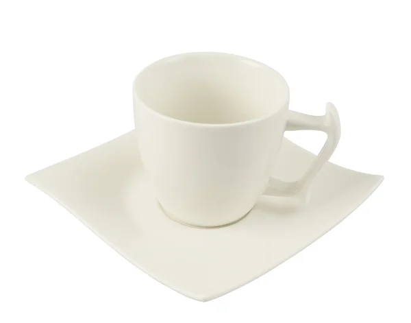Tea cup over a square plate isolated — Stock Photo, Image