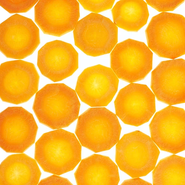 Oppervlak bedekt met ronde wortel segmenten — Stockfoto
