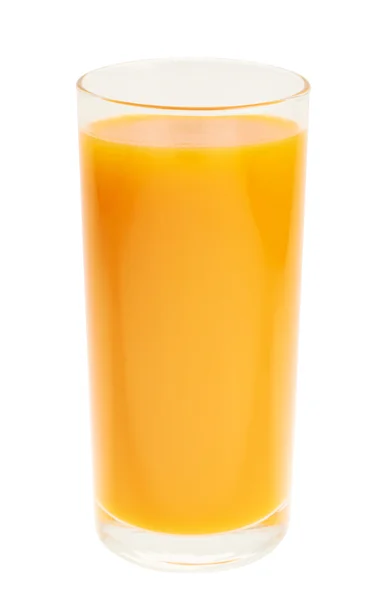 Hoog glas vol met oranje wortelsap — Stockfoto