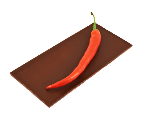 Çikolata üzerine kırmızı biber biber — Stok fotoğraf