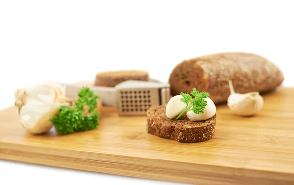 Composição de pão, alho e salsa — Fotografia de Stock