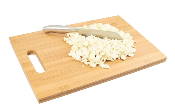 Cut in pieces white cabbage over cutting board — Stock Photo, Image