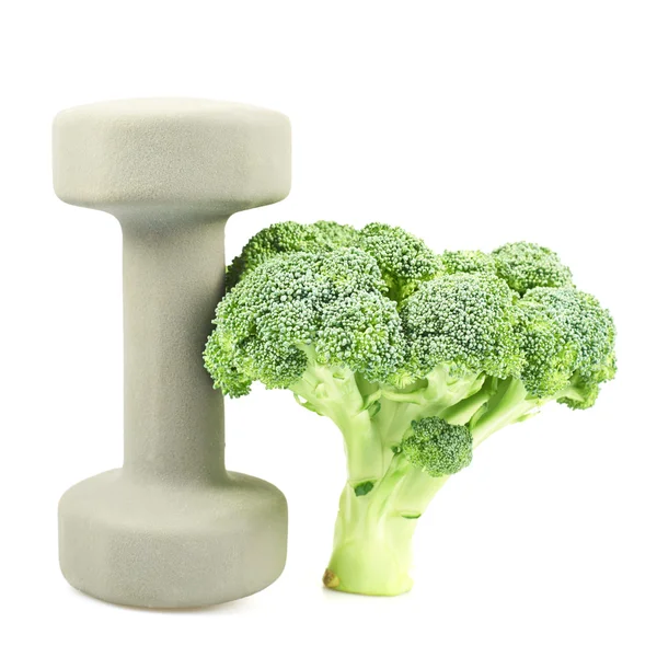 Broccoli verdi accanto a un manubrio — Foto Stock