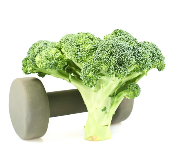 Broccoli verdi accanto a un manubrio — Foto Stock
