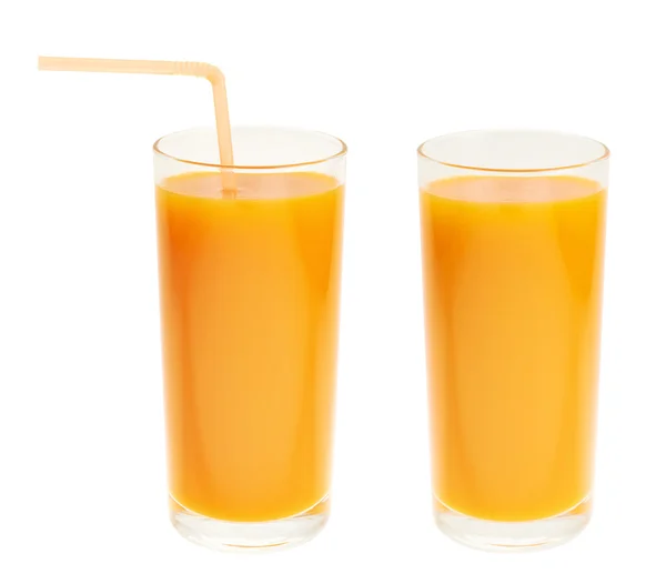 Un vaso alto lleno de jugo de zanahoria de naranja — Foto de Stock