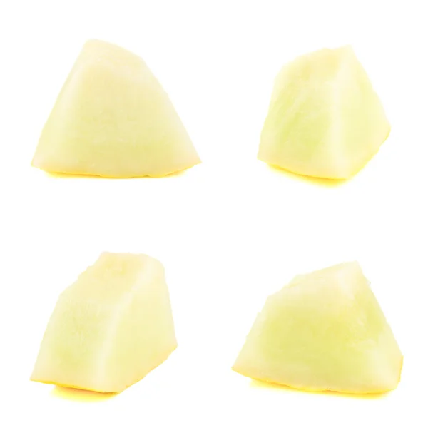 Quattro pezzi di melone isolati — Foto Stock
