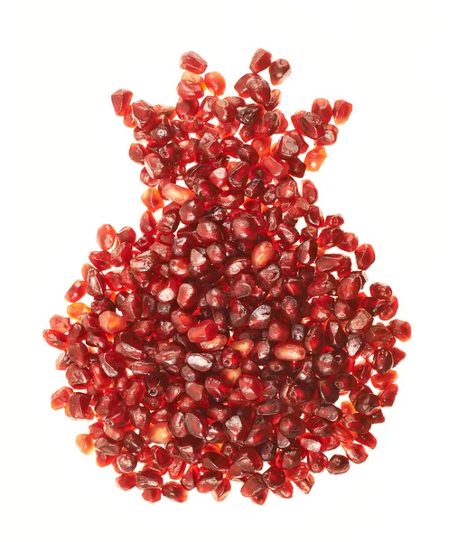 Pomegranate silhouette made of seeds — Stock Photo, Image