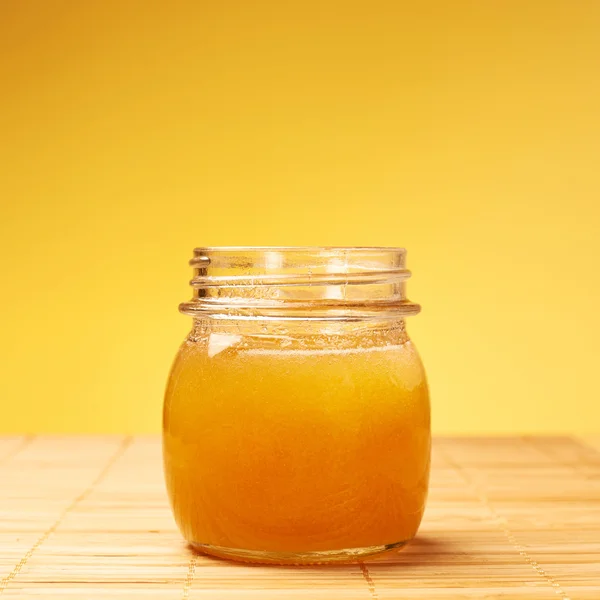 Opened honey jar — Stock Photo, Image