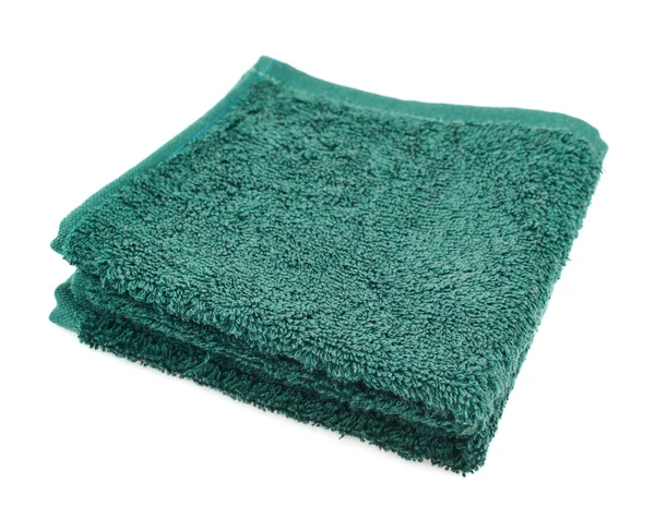 Складное махровое полотенце изолировано — стоковое фото