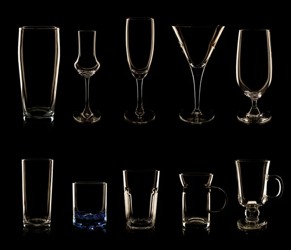 Set aus mehreren Gläsern und Flaschen — Stockfoto