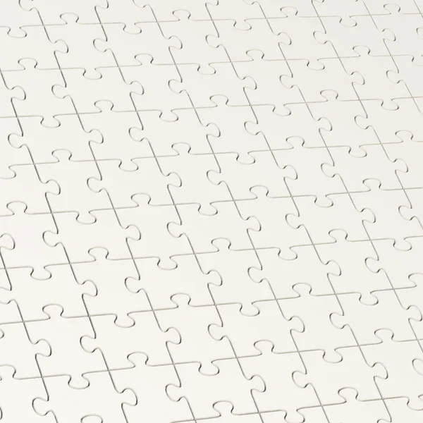 Surface covered with puzzle pieces — Stock Photo, Image