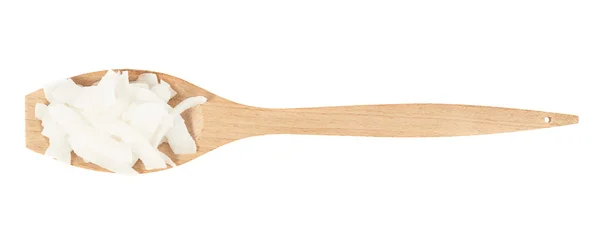Wooden spoon full of coconut's chips — Stock Photo, Image