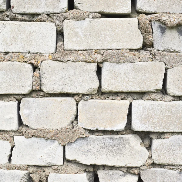 Vecchio frammento di muro di mattoni bianchi — Foto Stock