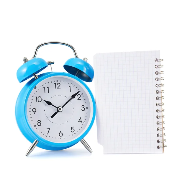 Alarm clock and notebook composition — Stock Photo, Image